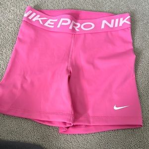 Pink nike pros size small
